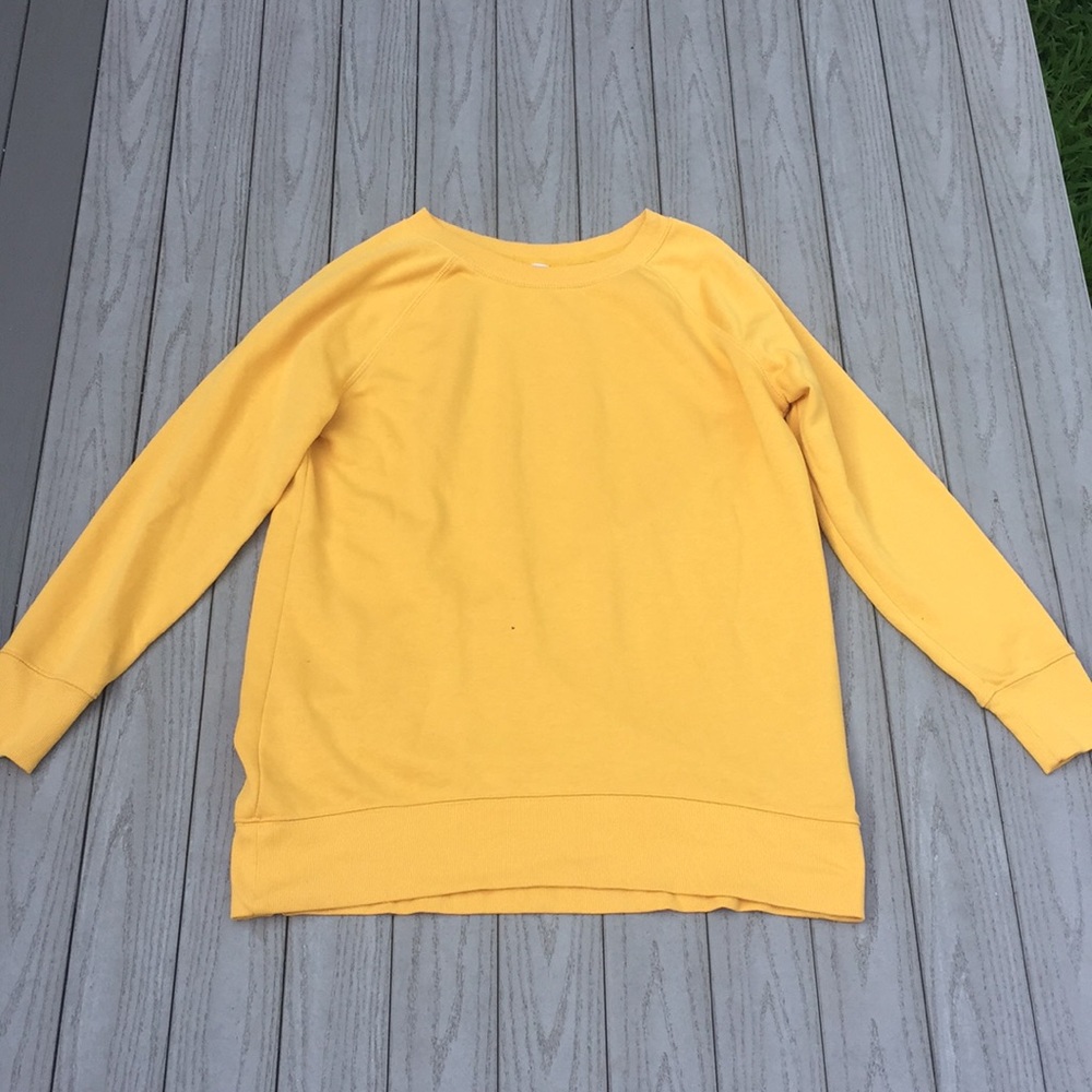 Oversized mustard yellow long sleeve shirt.